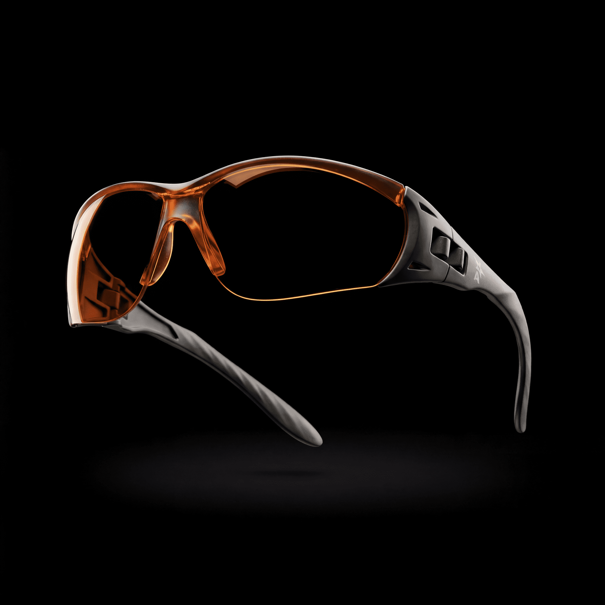 Schutzbrille mit bruchstabilem Nylon-Scharnier-System, schwarz, beschlagfreie Polycarbonatscheibe mit UV-Schutz 400, orange, metallfrei, kratzfest